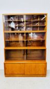 A SIMPLEX FOUR SECTION STACKING BOOKCASE OVERALL HEIGHT 180CM, WIDTH 122CM, MAX DEPTH 36CM.