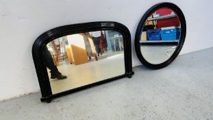 A VINTAGE BLACK LACQUERED OVERMANTEL MIRROR W 91CM AND A CIRCULAR WALL MIRROR WITH BEVELLED GLASS -