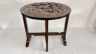 VINTAGE FOLDING HARDWOOD ORIENTAL TABLE WITH A CRAVED TOP.