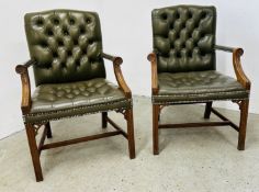 A PAIR OF GOOD QUALITY GREEN LEATHER BUTTON BACK OFFICE ELBOW CHAIRS.
