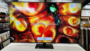 A SAMSUNG 75 INCH SMART TV MODEL QE75q80aat COMPLETE WITH REMOTE - SOLD AS SEEN.