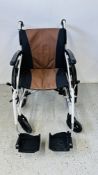 AN EXCEL G-LOGIC WHEELCHAIR.