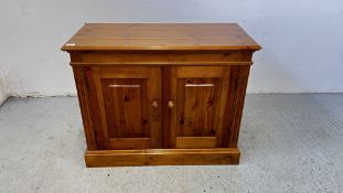 A HONEY PINE 2 DOOR CUPBOARD W 96 X D 45 X H 77.5CM.