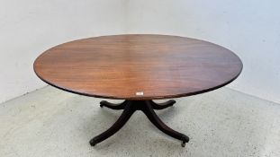 GEORGE III MAHOGANY OVAL SNAP-TOP BREAKFAST TABLE ON A TURNED PILLAR AND REEDED QUADRIPARTITE BASE.