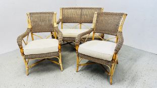 A GOOD QUALITY WICKER AND CANE THREE PIECE CONSERVATORY SUITE WITH CUSHIONED SEATS.