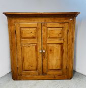 ANTIQUE STRIPPED PINE WALL HANGING CORNER CABINET W 127CM H 126CM.