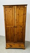 A PINE DOUBLE WARDROBE WITH DRAWER TO BASE, W 86CM X D 52CM X H 179CM.