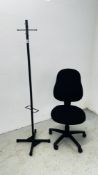 A REVOLVING ADJUSTABLE OFFICE CHAIR ALONG WITH A FLOOR STANDING COAT STAND.