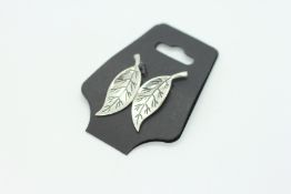 A PAIR OF DESIGNER NORWEGIAN SILVER LEAF CLIP ON EARRINGS MARKED D.A. (DAVID ANDERSON).