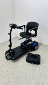 A DRIVE SCOUT COMPACT FOLDING MOBILITY SCOOTER WITH KEY AND CHARGER - SOLD AS SEEN.