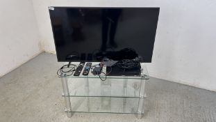 PANASONIC 40 INCH TV MODEL NUMBER TX-40 JX800B + REMOTE ALONG WITH A PANASONIC RECORDER BOX AND