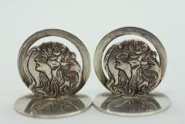 A PAIR OF STERLING SILVER MENU HOLDERS IN THE NOUVEAU STYLE.