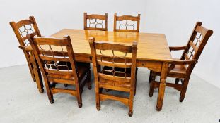 A RUSTIC RECLAIMED DINING / KITCHEN TABLE WITH 4 X MATCHING CHAIRS AND TWO CARVERS,