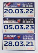 THREE PRESSED ALUMINIUM F1 NUMBER PLATES BAHRAIN GRAND PRIX 21, 22 & 23 EXAMPLES.