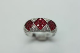 A RUBY AND DIAMOND RING,