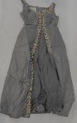 A VINTAGE BLACK SATIN BEADED EVENING GOWN BEARING ORIGINAL MAKERS LABEL TRICOBILLE,
