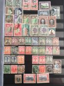 STAMPS: TWO STOCKBOOKS WITH COMMONWEALTH MINT AND USED, A FEW FOREIGN AND OTHERS.