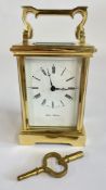 AN ANTIQUE BRASS CARRIAGE CLOCK AND KEY MARKED WALSH BROTHERS, 13 JEWELS UNADJUSTED H 11.5CM.