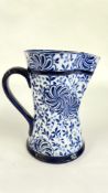 A VINTAGEE DOULTON BURSLEM FLOW BLUE PITCHER H 20CM.