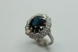A SAPPHIRE AND DIAMOND RING,