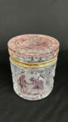 A VINTAGE BOHEMIAN STYLE CUT GLASS LIDDED JAR WITH GILDED TRIM DIAM 10.5CM X H 13CM.