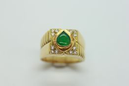 A CHRYSOPRASE AND DIAMOND RING, THE TEARDROP CENTRAL STONE SURROUNDED BY FOUR THREE DIAMOND PANELS,
