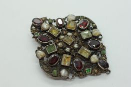 A STONE SET AUSTRO HUNGARIAN BROOCH.
