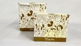 2 X LARGE BOXED DISNEY SNOW GLOBES TO INCLUDE MULAN AND 101 DALMATIANS.