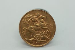 1910 FULL SOVEREIGN GOLD COIN.