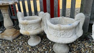 A PAIR OF TWIN HANDLED URN DESIGN STONEWORK PEDESTAL GARDEN PLANTERS - HEIGHT 50CM.