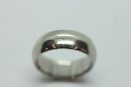 A PLATINUM GENTLEMAN'S WEDDING RING.