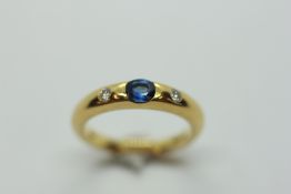 A SAPPHIRE AND DIAMOND RING,