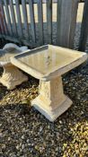 A SQUARE STONEWORK GARDEN BIRD BATH DECORATED WITH ROSE DESIGN - HEIGHT 50CM.