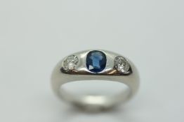A SAPPHIRE AND DIAMOND RING,