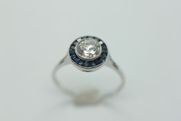 A PLATINUM AND SAPPHIRE RING,