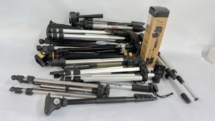 A LARGE JOB LOT OF CAMERA TRIPODS.