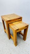 TWO MODERN LIGHT OAK OCCASIONAL TABLES.