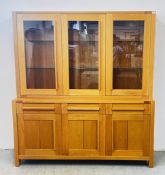 MODERN LIGHT OAK THREE DOOR DRESSER WITH CUPBOARDS AND DRAWERS TO BASE, W 179CM X D 51CM X H 198CM.