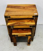 RUSTIC HARD WOOD GRADUATED SET OF THREE OCCASIONAL TABLES.