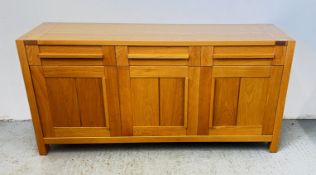 MODERN LIGHT OAK THREE DOOR, THREE DRAWER DRESSER BASE, W 179CM X D 50CM X H 89CM.