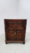 A HEAVILY CARVED ORIENTAL DESIGN DRINKS CABINET, W 86CM X D 43CM X H 105CM.