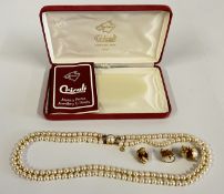 A STRING OF MALLORCAN SIMULATED PEARLS 