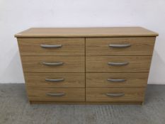 A BEECHWOOD FINISH 8 DRAWER CHEST OF DRAWERS, W 119.5CM X D 40CM X H 75CM.