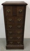 ANTIQUE OAK 10 DRAWER UPRIGHT FILING CHEST WITH BRASS FITTINGS.