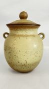 A STONEWARE TWO HANDLED JAR AND COVER OF BALUSTER FORM, HEIGHT 35CM.