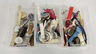 THREE TRAYS CONTAINING A COLLECTION OF ASSORTED WRIST WATCHES TO INCLUDE DESIGNER BRANDED EXAMPLES.
