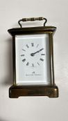 A BRASS CARRIAGE CLOCK MARKED 