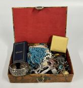 AN EGYPTIAN LEATHER BOUND BOX AND CONTENTS TO INCLUDE MODERN AND VINTAGE BEADED NECKLACES,