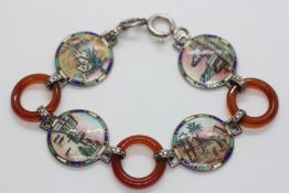 A 1920'S SILVER AND ENAMEL EGYPTIAN REVIVAL BRACELET.