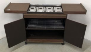 A PHILIPS HEATED HOSTESS TROLLEY COMPLETE WITH FITTINGS - SOLD AS SEEN.